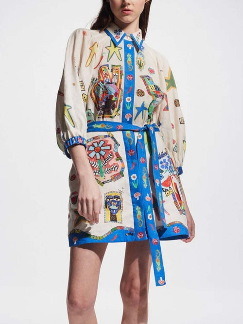 MINI VESTIDO CON ESTAMPADO TROPICAL Y CINTURÓN