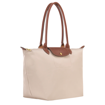 Bolso Grande Premium, Papel